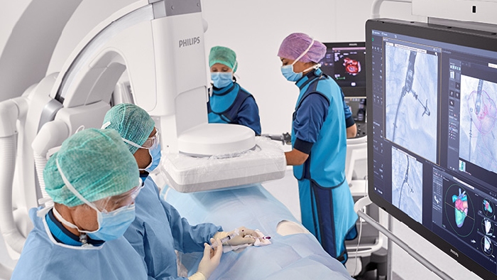 (opens in the same window) Interventional cardiologists performing percutaneous coronary intervention with Azurion and IntraSight